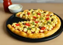 pizza de pipoca, curau, rapadura e pé de moleque